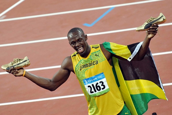 usain bolt running. Usain Bolt celebrates his