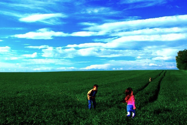 children on meadow Photo by Marzanna Syncerz © PhotoXpress.com